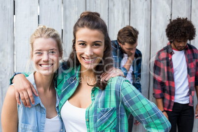 Portrait of women embracing each other