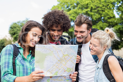 Friends looking at map Friends looking at map