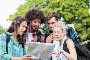 Friends looking at map