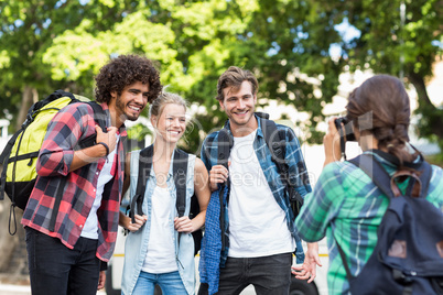 Woman taking photo of her friends