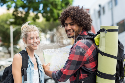 Young couple smiling at camera