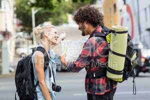 Young couple looking at map