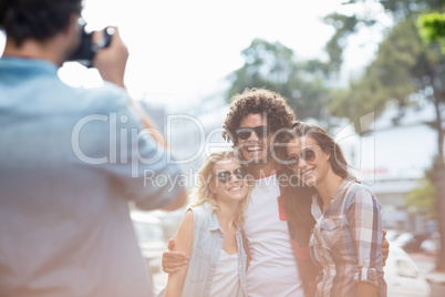 Man taking photo of his friends