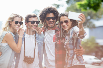 Friends taking selfie on a mobile phone