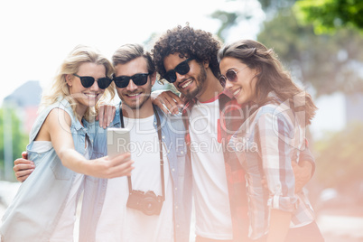 Friends taking selfie on a mobile phone