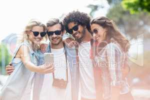 Friends taking selfie on a mobile phone