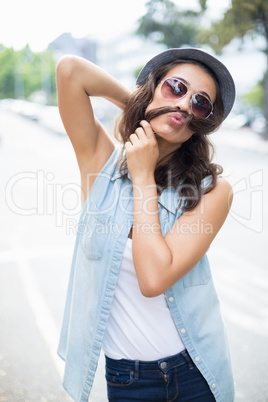 Young woman pulling funny faces
