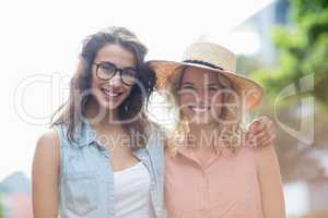 Young women embracing each other