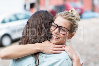 Friends embracing each other