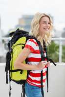Young woman carrying backpack