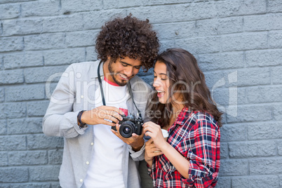 Young couple looking in camera