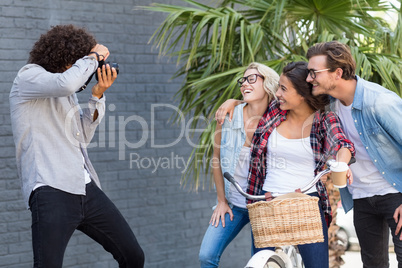 Man taking photo of his friends