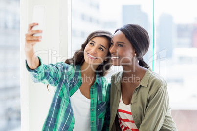 Friends taking selfie