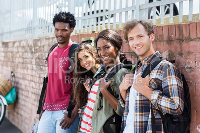 Portrait of happy friends standing together