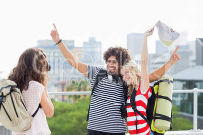 Woman taking photo of her friends