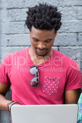 Young man using laptop