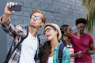 Couple taking selfie on a mobile phone