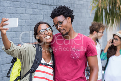 Couple taking selfie on a mobile phone