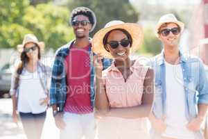 Friends in smiling at camera