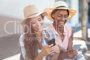 Young women using mobile phone