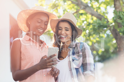 Young women using mobile phone