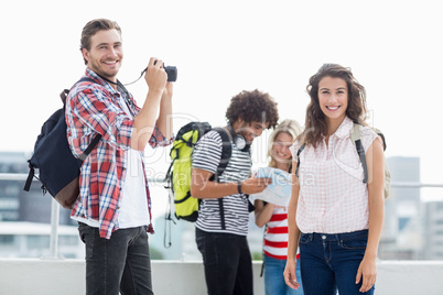 Young man taking photo of woman