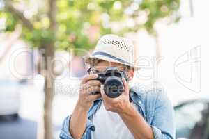 Man taking photo outdoors