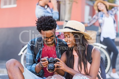 Young couple looking in camera