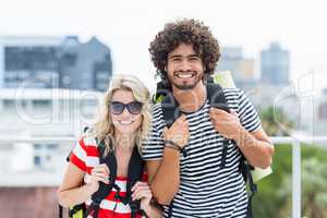 Portrait of young couple in sunglasses