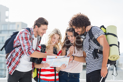 Friends looking at map