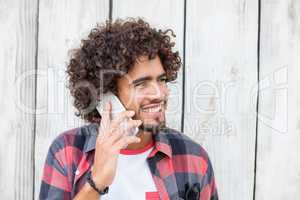 Young man talking on mobile phone