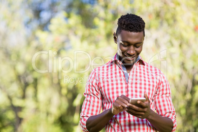 Happy man using his smartphone