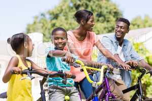 Happy family doing bicycle