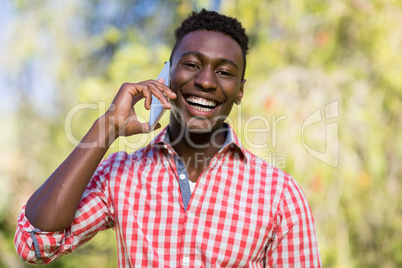 Happy man using his smartphone