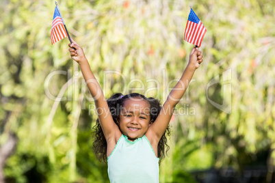 Young girl showing usa flag