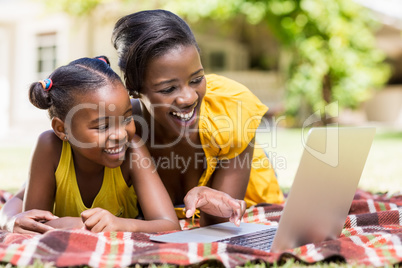 Happy family watching a laptop