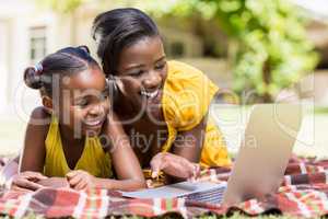 Happy family watching a laptop