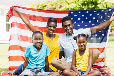 Happy family showing usa flag