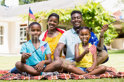 Happy family showing usa flag