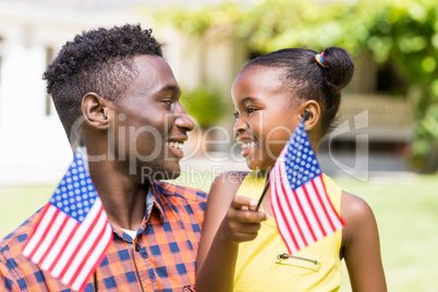 Happy family showing usa flag