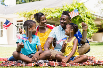 Happy family showing usa flag