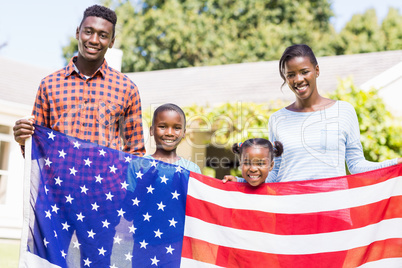 Happy family showing usa flag