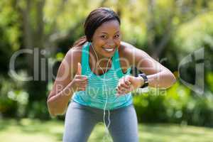 Happy woman doing thumbs up