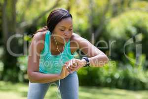 Woman looking her watch