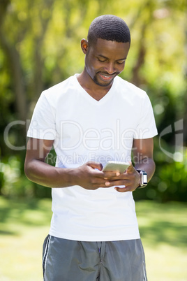 Happy man using his smartphone