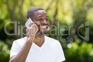 Happy man talking on the phone