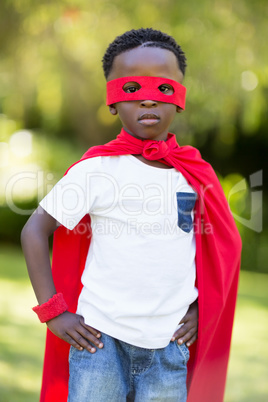 Young child dressing up as a hero