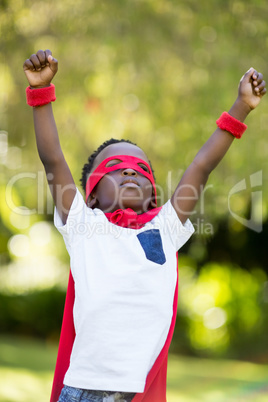 Young child dressing up as a hero