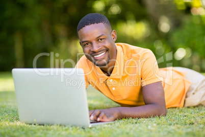 Happy man using his laptop