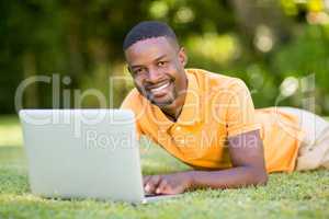 Happy man using his laptop